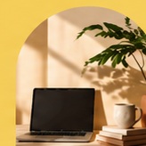 Laptop and botanical still life representing digital content